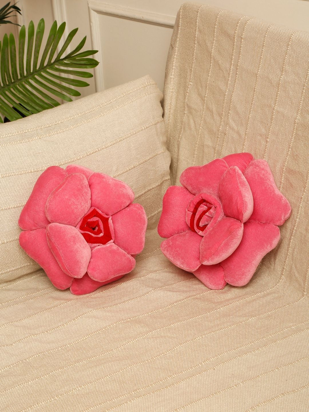 Pink poly cotton round cushions, set of 2