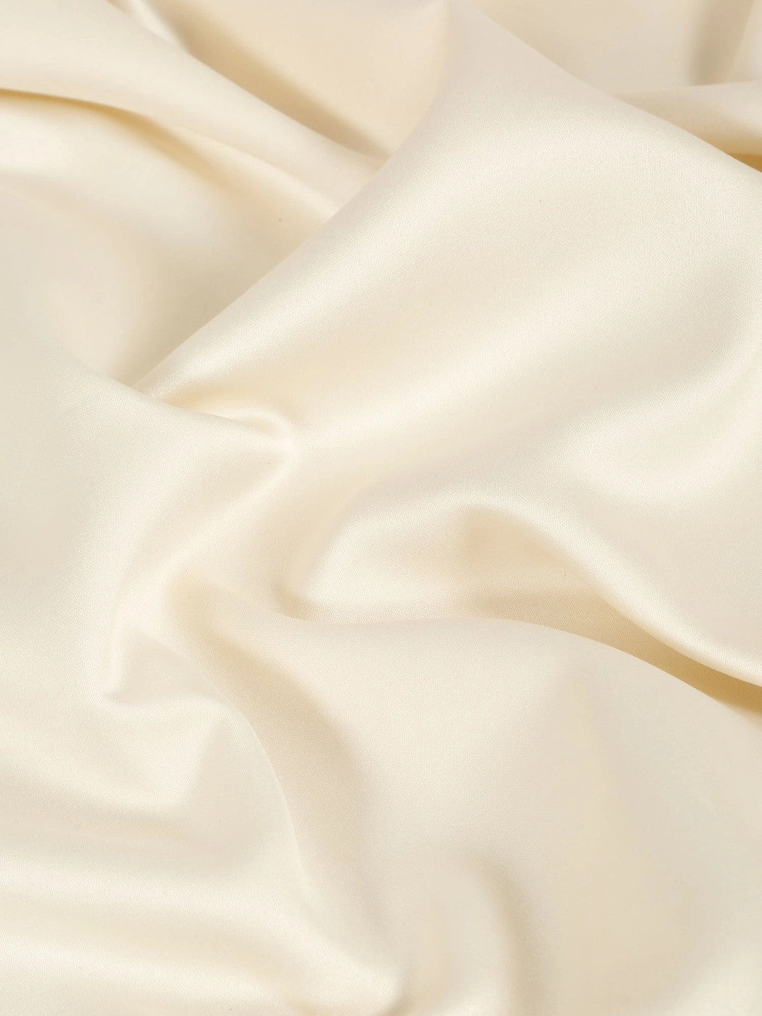 Cream-coloured king bedsheet
